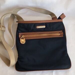 Michael Kors navy nylon crossbody bag with soft shoulder strap, gold zipper